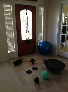 Some of my exercise equipment: stability ball, foam roller, medicine ball, ab wheel, BOSU, TRX Bands