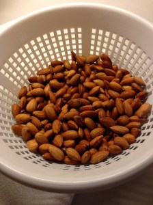 Straining the soaked, raw almonds