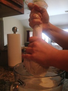 Squeezing milk out of the bag